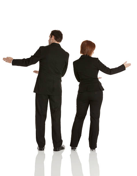 istock Rear view of a business couple gesturing 175445718