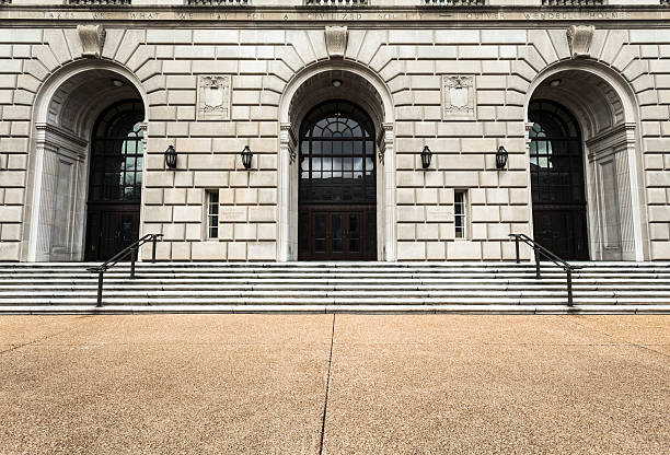 Internal Revenue Building The IRS Service Building on Constitution Avenue in Washington DC. IRS Headquarters Building stock pictures, royalty-free photos & images