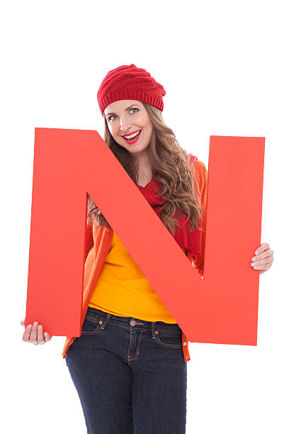 istock Woman holding letter N. 175446364