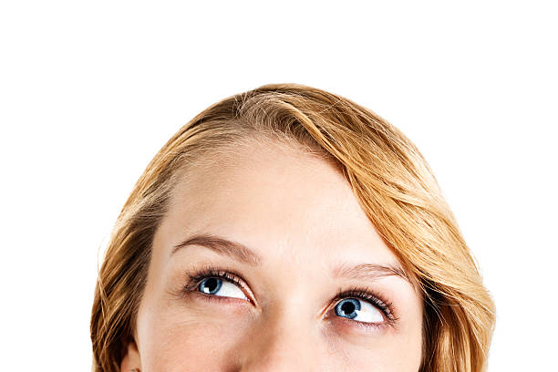 istock Close-up on pretty blonde with smiling eyes looking sideways 175446639