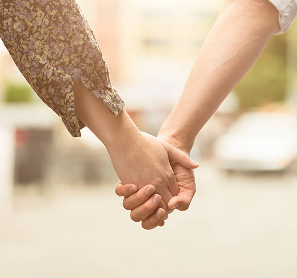 istock Holding hands, caucasian couple in love 175446832