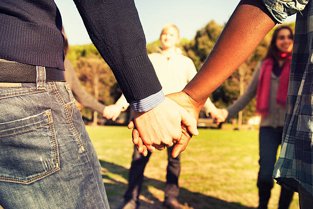 istock Holding hands, multiracial couple in love 175447632