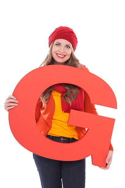 istock Woman holding letter G. 175447801