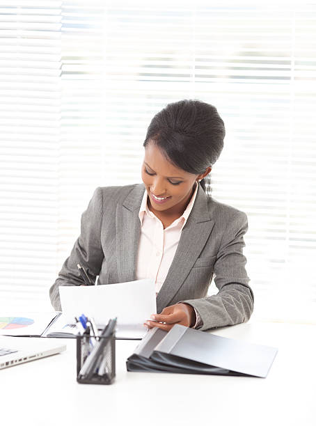 istock Businesswoman writing report at office. 175447908