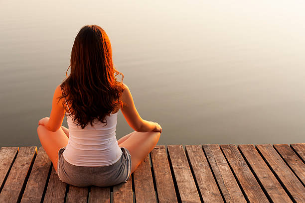 istock Young woman enjoying the sunset 175448186
