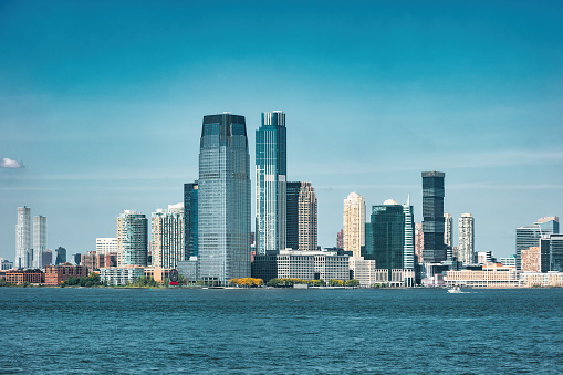 Jersey City Skyline, New Jersey, USA as seen from New York Harbor.