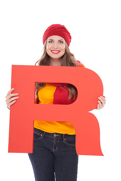 istock Woman holding letter R. 175448852