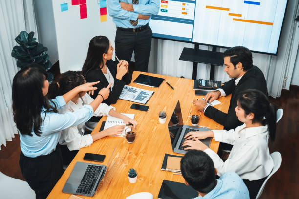 istock Multi ethnic diversity business people and modern business project. Habiliment 1754492131