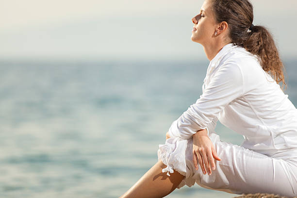 istock young woman absorbed in thought 175449219