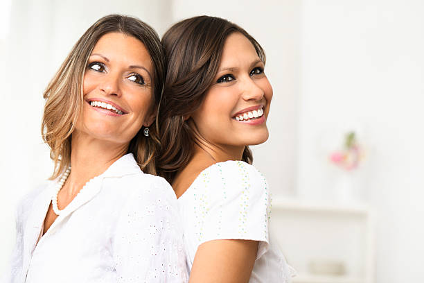 Happy mother posing with her daughter