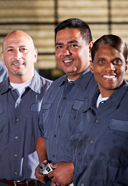 istock Team of mechanics 175450229