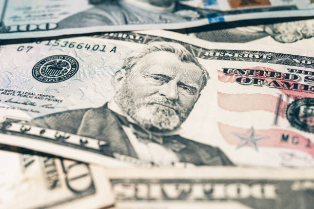 istock Multiple US dollars. Background of dollars. 1754508745