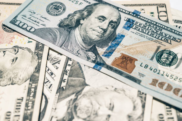 istock Multiple US dollars. Background of dollars. 1754510516