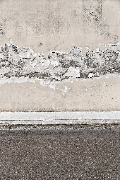 istock Old concrete grunge wall with sidewalk 175451169