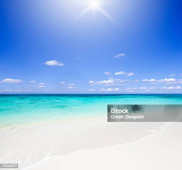 Idyllic Tropical Beach Backlit With Sun Stock Photo - Download Image Now - Caribbean, Summer, Turquoise Colored