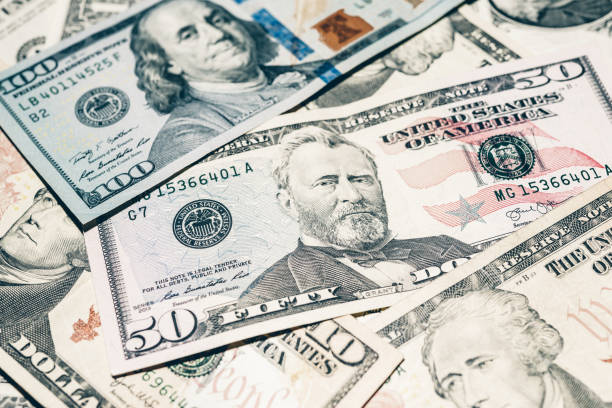 istock Multiple US dollars. Background of dollars. 1754517056