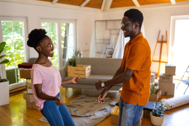 istock Couple dancing in new home 1754522994