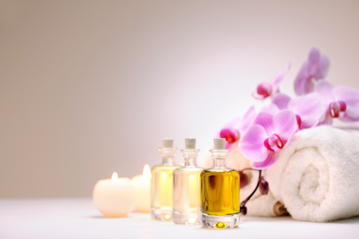 Aromatherapy oil bottle with candle light -selective focus- XXXL image