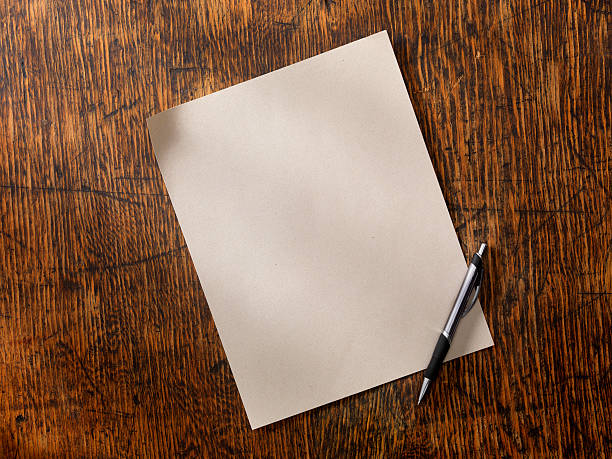 Blank Paper Blank Recycled Paper on an Old Wooden Desk -Photographed on Hasselblad H3D2-39mb Camera message photos stock pictures, royalty-free photos & images