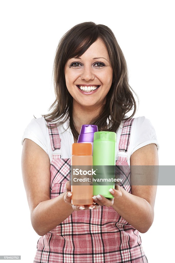 Mujer joven con productos cosméticos - Foto de stock de Abundancia libre de derechos