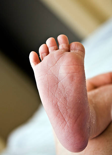 istock Newborn baby foot 175452925