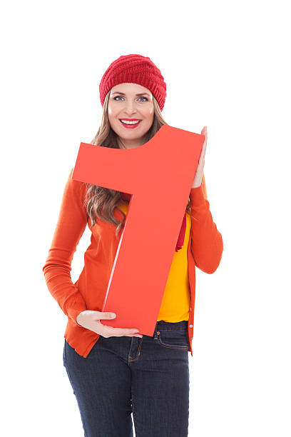 istock Woman holding number 1. 175453198