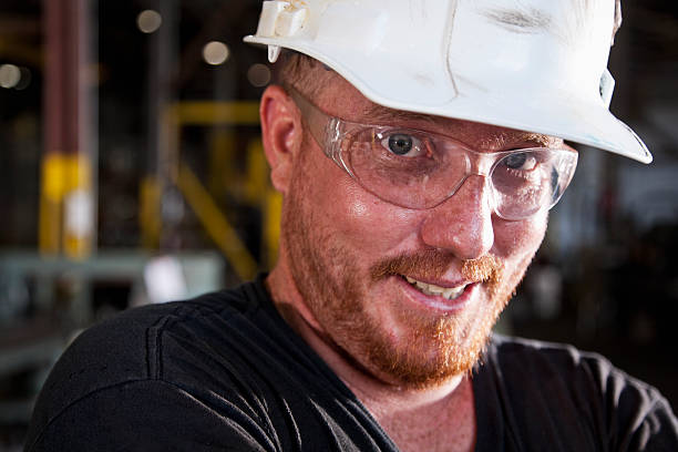 istock Close up of worker wearing hardhat 175453846