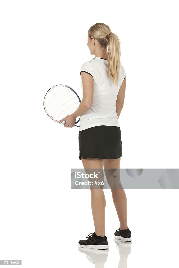 Vista traseira de uma mulher Jogador de tênis - Foto de stock de Tênis - Esporte de Raquete royalty-free