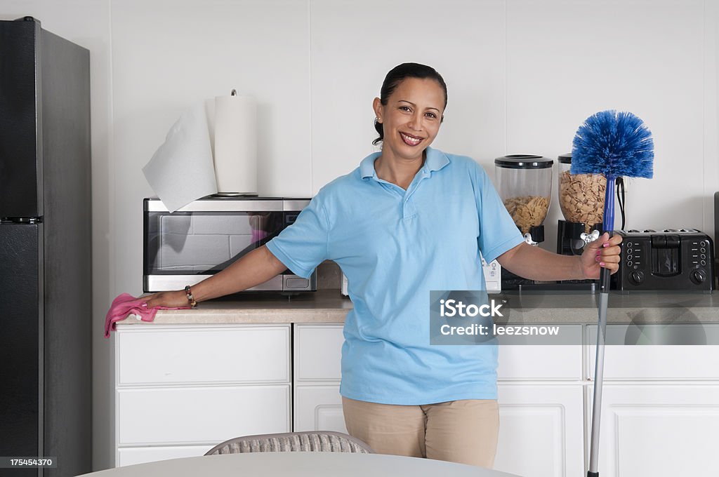 Donna pulizia una pausa CAMERA Corporate - Foto stock royalty-free di Custode