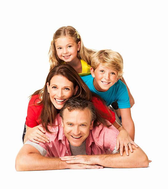 istock Cheerful Family Lying On Each Other - Isolated 175454704