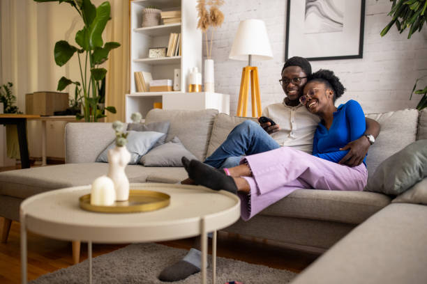 istock Couple watching tv at home 1754547970