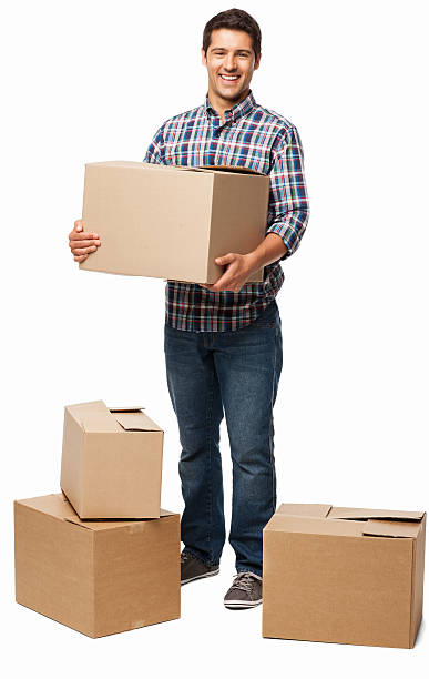 istock Young Man Carrying Cardboard Box - Isolated 175454978