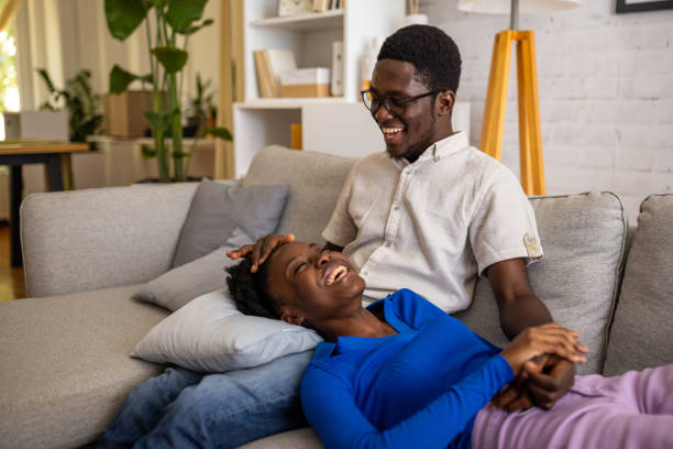 istock Happy couple relaxing at home 1754554172