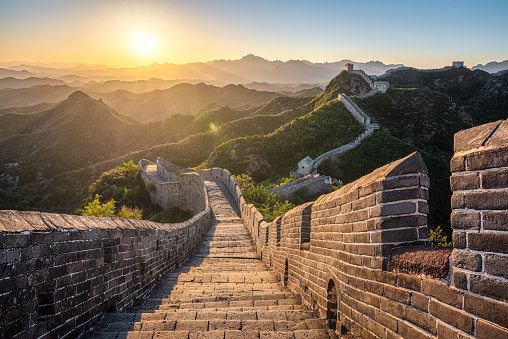 Empty Great wall of China under sunshine during sunset at the Jinshanling Section