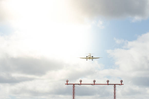 Commercial jet airplane approaching the Quebec city airport during autumn day