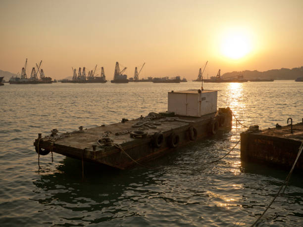 istock Sunset at Victoria Harbour, Hong Kong, China 1754588885