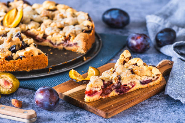 istock Homemade German plum cake (Zwetschgenkuchen) with yeast dough and crumbles 1754589452