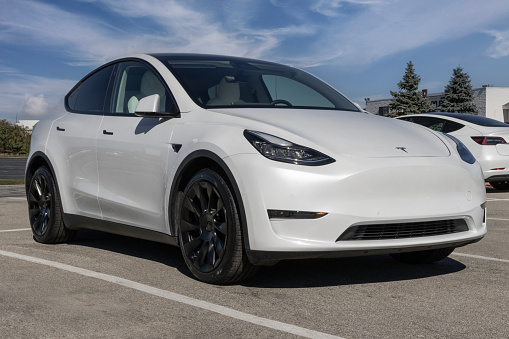 Indianapolis - October 22, 2023: Used Tesla Model Y display at a dealership. To meet high demand, Tesla buys and sells pre-owned cars.