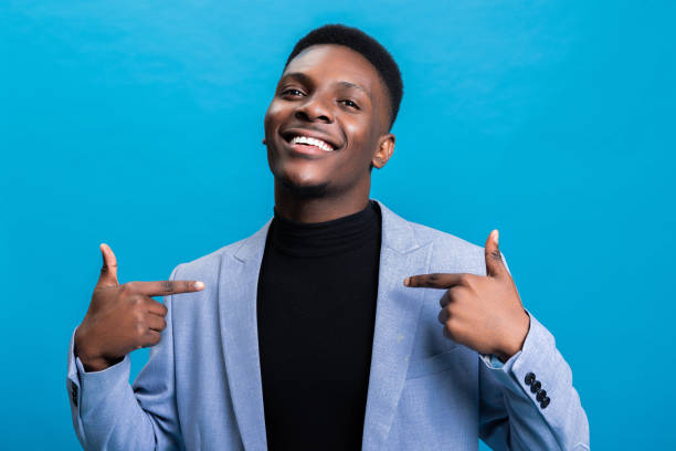 istock Pointing with confident expression indicating being proud of accomplishments or skills. In this case, he might be a successful businessperson, athlete artist 1754625635