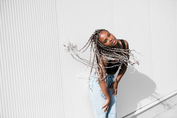 istock Stylish woman with a braids on white background 1754627799