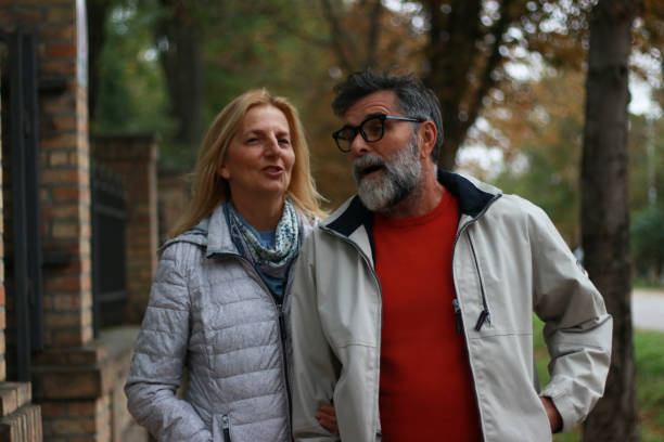 istock Senior couple walking on street 1754629302
