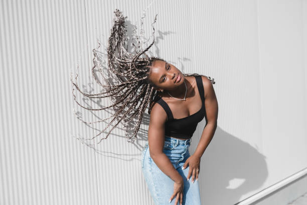 istock Stylish woman with a braids on white background 1754629507