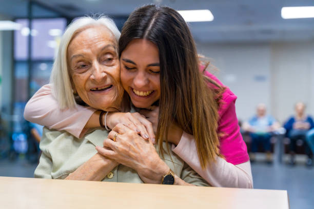 istock Cute moment in a nursing home between nurse and patient 1754630223