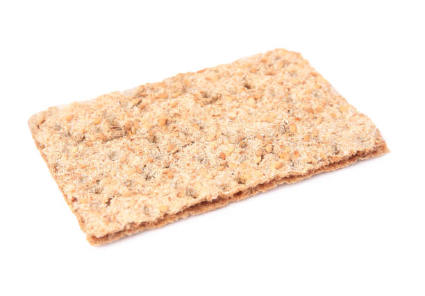 istock Fresh crunchy crispbread on white background. Healthy snack 1754630521