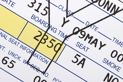 close up of air travel boarding pass
