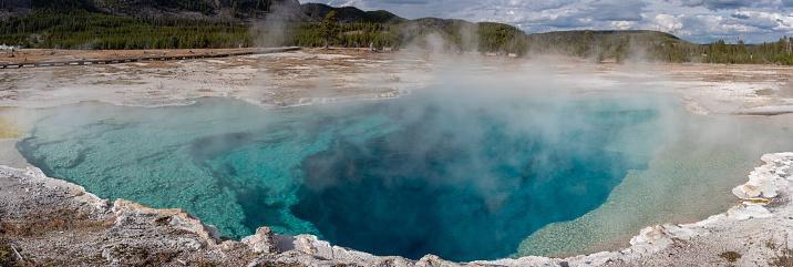 Brilliant blue thermal pool in Yellowstone National Park