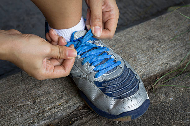 istock Tying sports shoe 175465262