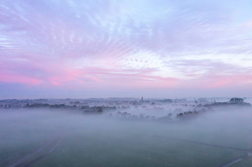 Foggy sunrise in North Holland, The Netherlands.