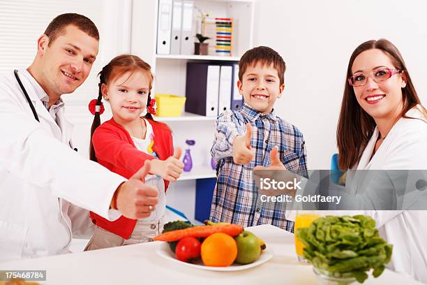 Vitamins From The Doctor Stock Photo - Download Image Now - 6-7 Years, Adult, Boys