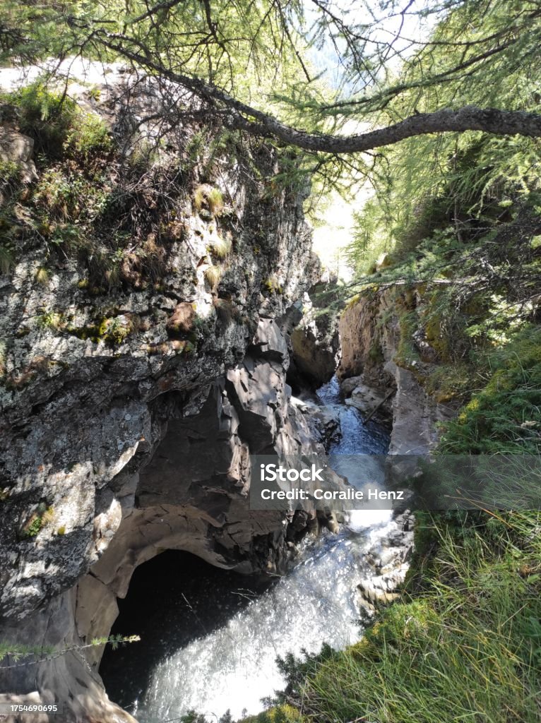 Waterfall above Crans-Montana, near Bisse of Tsitorret, Crans-Montana, Valais, Suisse Blue Stock Photo
